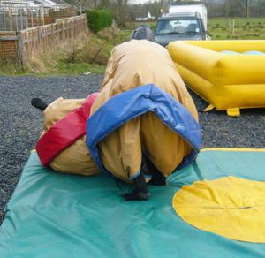 2 Childrens Size Sumo Suits